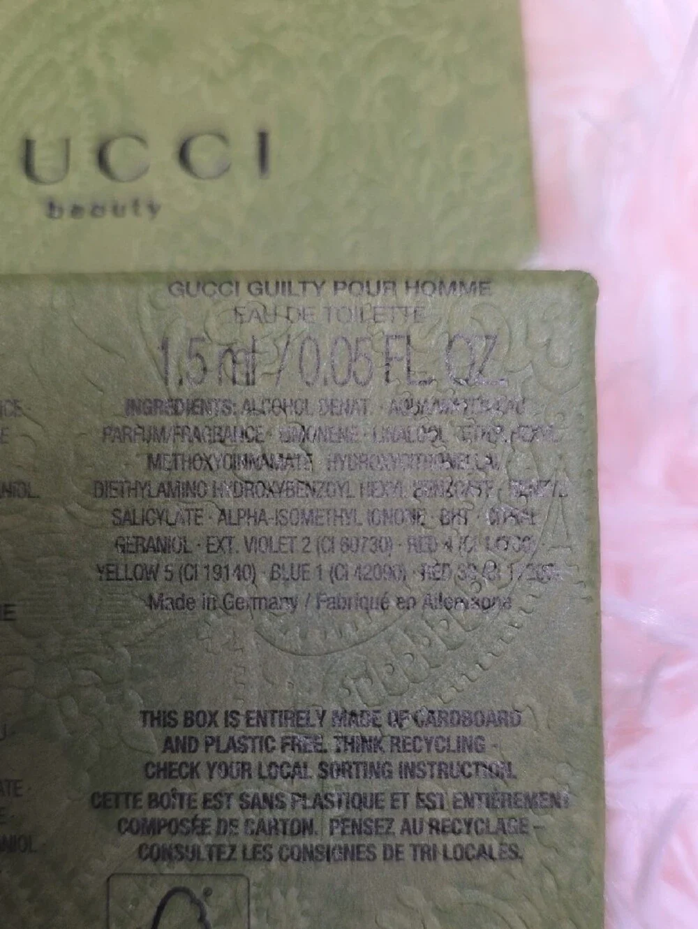 Gucci embossed olive green perfume box with subtle metallic logo